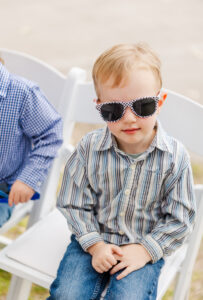 kid wearing sunglasses