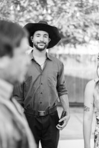 friend hanging out at wedding 