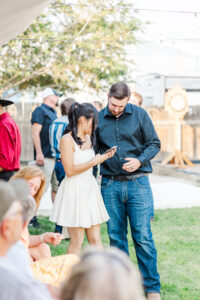 bride and groom chatting at wedding 