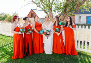 bridal party laughing at lamoille church 