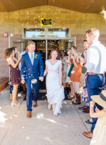Bride running with groom