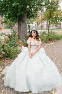 A beautiful woman having a portrait session for her Quinceañera in Elko