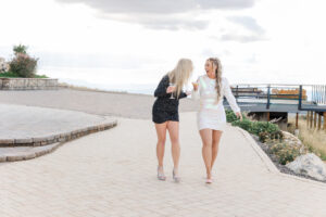 girls laughing and walking at Ruby 360 Lodge 