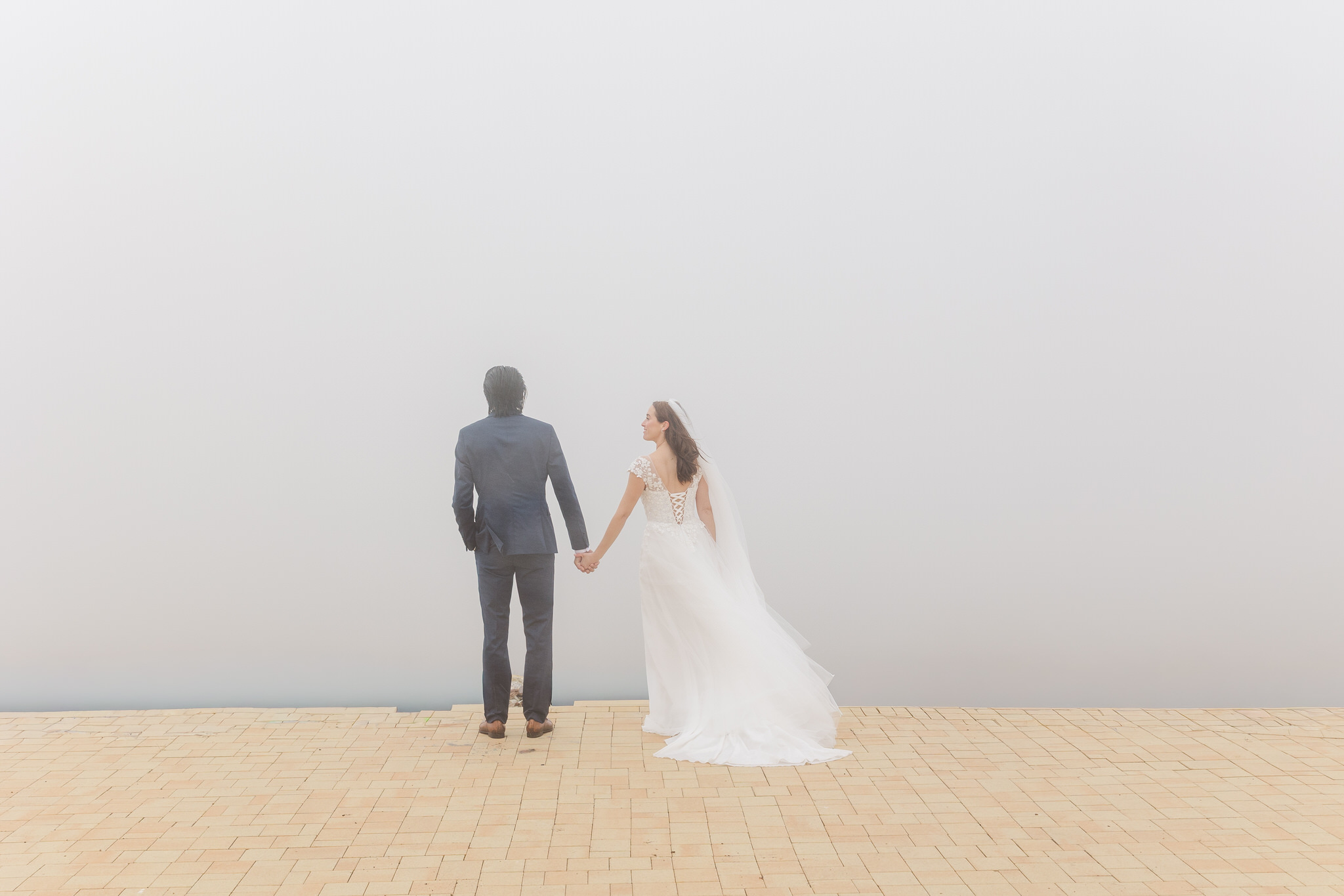 Ruby360 Bride and Groom holding hands