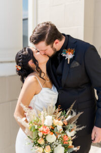 Bride and Groom kissing after ceremony