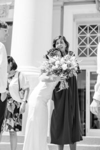 Bride and Grooms mom hugging