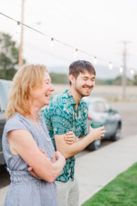 friends laughing while playing games 