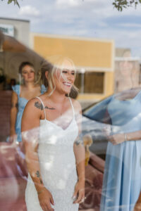 bride looking out window 