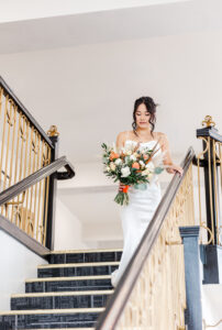 Bride walking down the stairs at an Elko Nevada Hotel