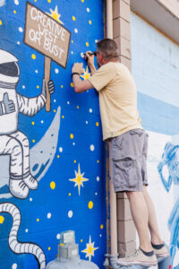 man painting