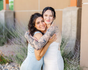 Elko Conference Center friends hugging a lot