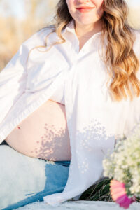 flowers reflecting on moms belly 