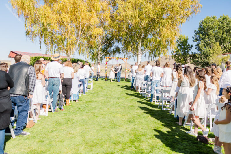 everyone praying at Maggie Creek Ranch