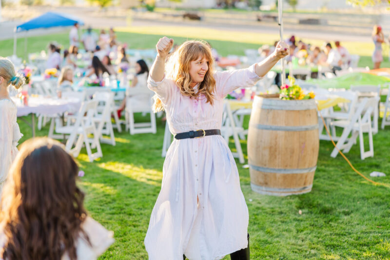 girl dancing at maggie creek ranch