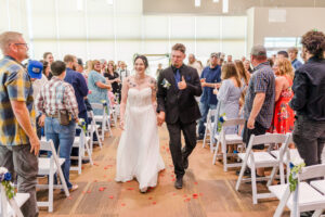 bride and groom walking at an elko wedding venue 