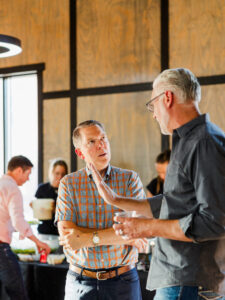 Creative West men talking