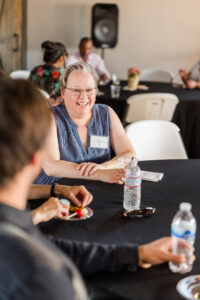 Creative West woman laughing