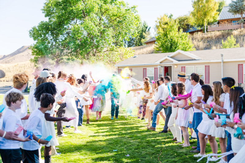 holi running and throwing color