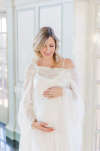 A woman holding her baby's belly in richmond Virginia 