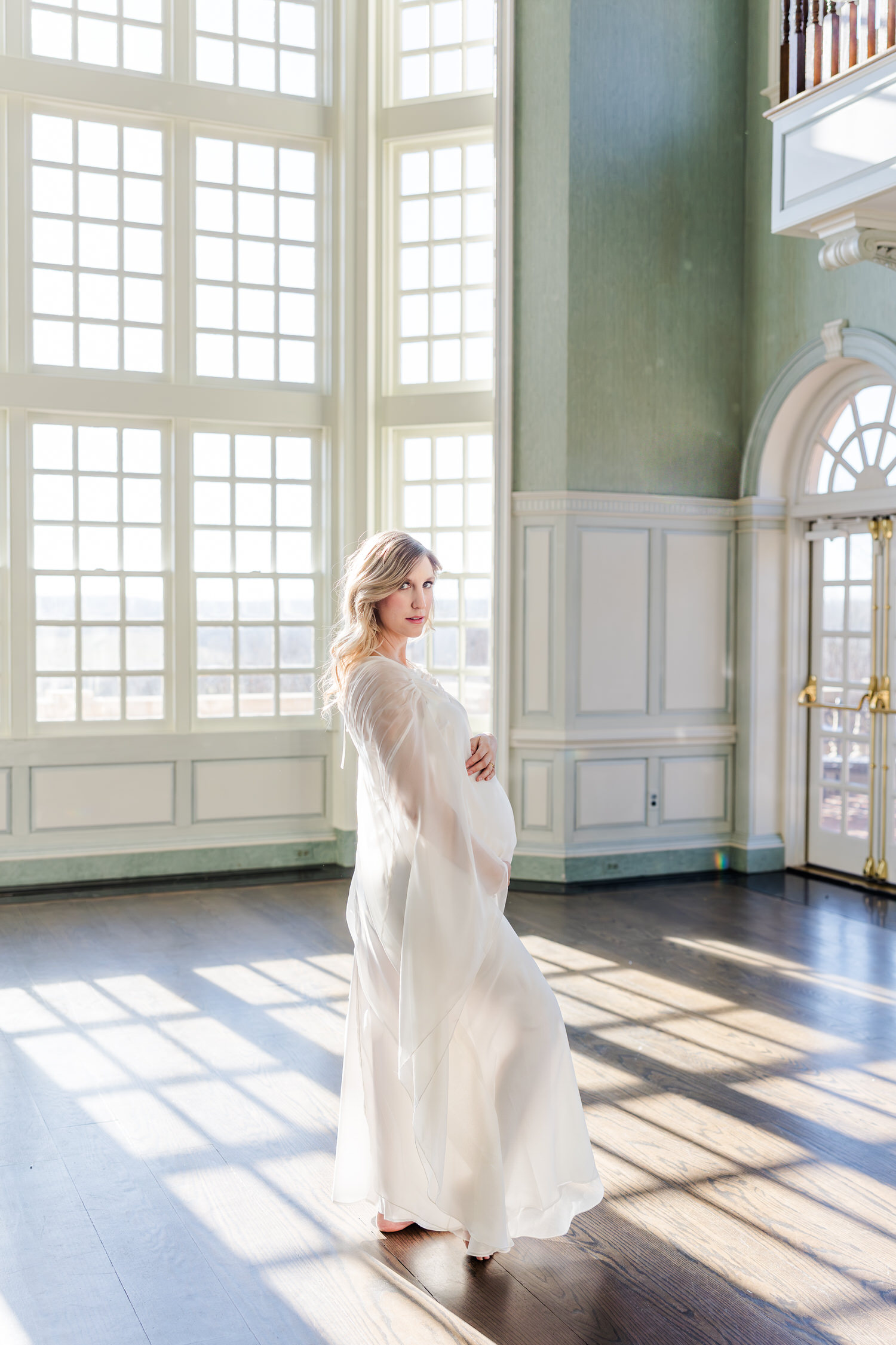 Richmond Maternity session, woman looking at me holding belly