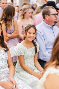 little girl smiling at me