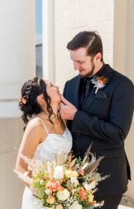 couples pose after their Elko Courthouse Wedding