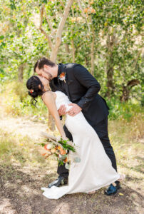 groom dipping bride 