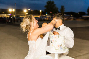 she puts the cake on his face