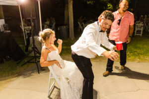 groom giving bride lapdance