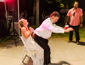 bride laughing from lapdance