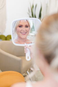 carlene looking at herself for Carlene and Jose's Wedding Portfolio
