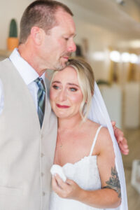 carlene crying while hugging her dad for Carlene and Jose's Wedding Portfolio