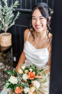 bride posing for me and smiling for wedding portfolio 